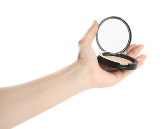 Photo of Woman holding black pocket powder with mirror on white background, closeup. Cosmetic product