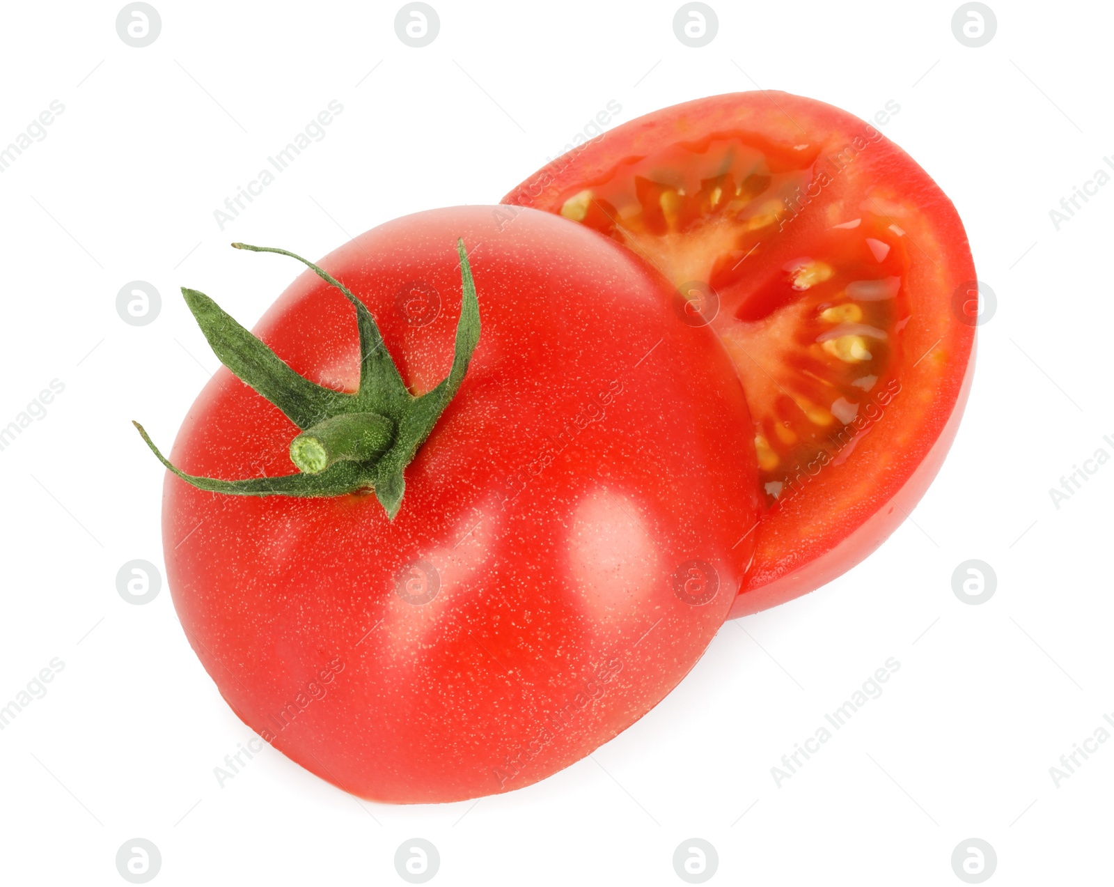 Halves of ripe cherry tomato isolated on white Photo of Halves of ripe cherry tomato isolated on white