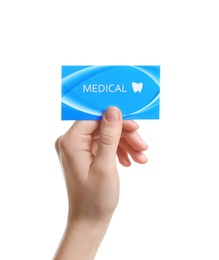 Photo of Woman holding business card isolated on white, closeup. Dental medical service