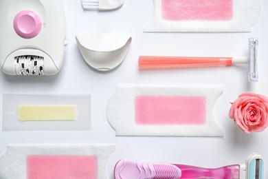 Photo of Set for epilation on white background, flat lay