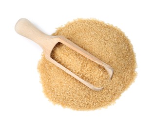 Photo of Pile of brown sugar and wooden scoop isolated on white, top view