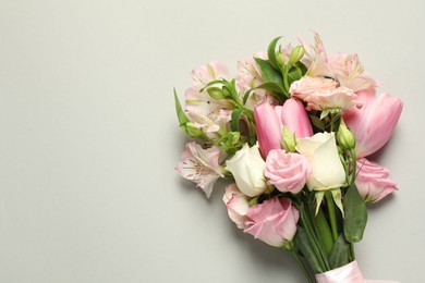 Photo of Happy Mother's Day. Bouquet of beautiful flowers on light grey background, top view. Space for text