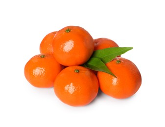Photo of Fresh ripe tangerines and green leaves isolated on white