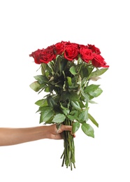 Woman holding beautiful red roses on white background