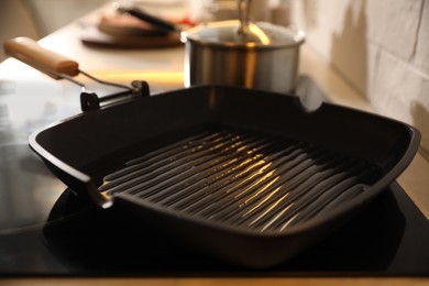 Photo of Frying pan with cooking oil on stove