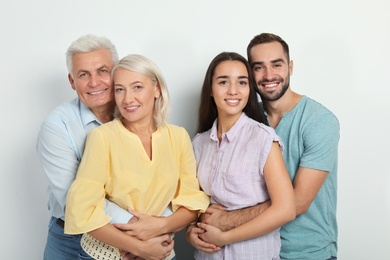Photo of Portrait of happy family on white background