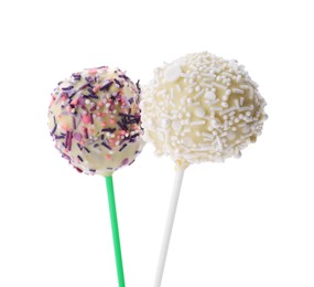 Sweet cake pops decorated with sprinkles isolated on white. Delicious confectionery