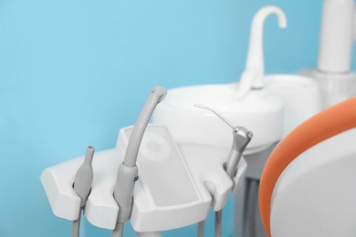 Photo of Professional dentist's equipment in modern clinic, closeup