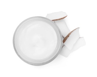 Photo of Jar of body cream with coconut on white background, top view