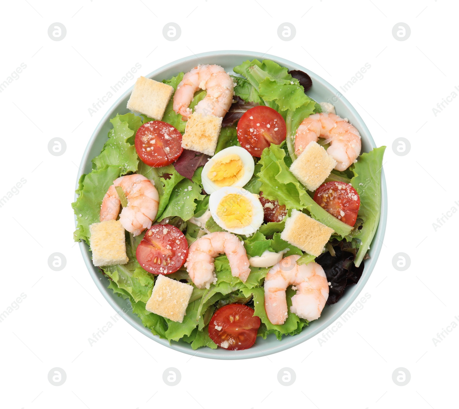 Photo of Delicious Caesar salad with shrimps isolated on white, top view