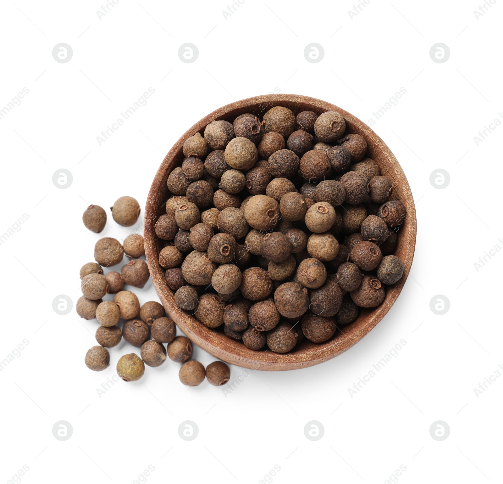 Photo of Dry allspice berries (Jamaica pepper) in bowl isolated on white, top view