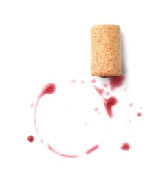 Photo of Bottle cork with wine stains isolated on white, top view