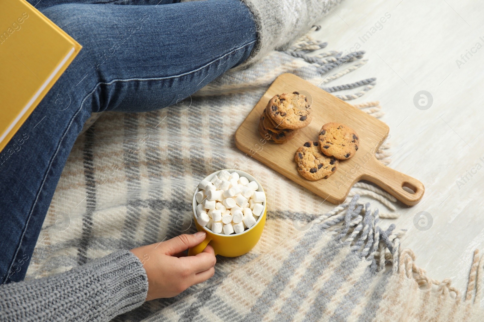 Photo of Woman with cup of hot cocoa, above view. Winter drink