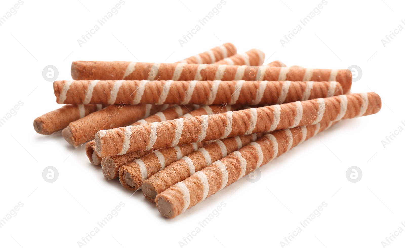 Photo of Tasty wafer roll sticks on white background. Crispy food