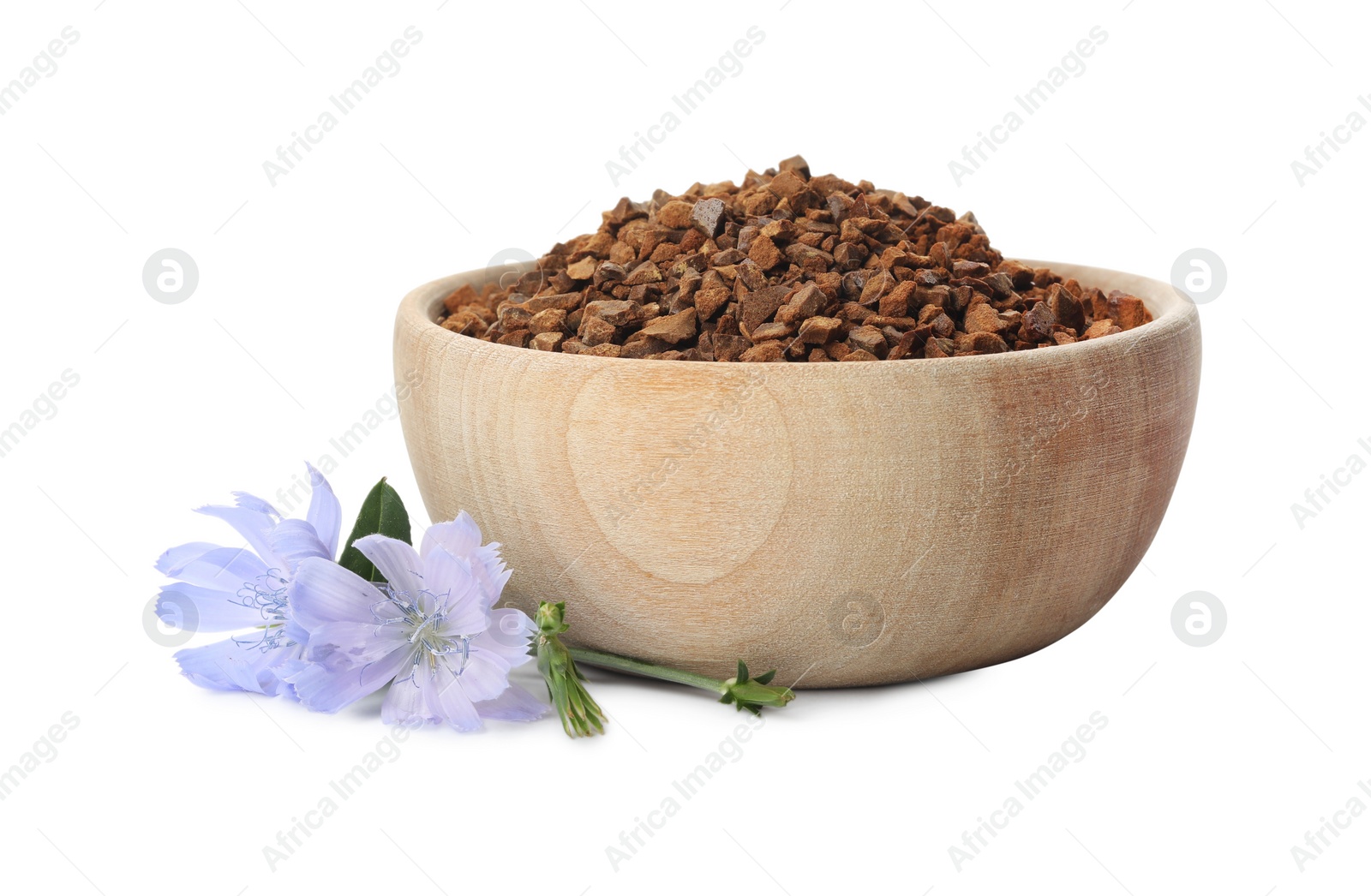 Photo of Bowl of chicory granules and flowers on white background