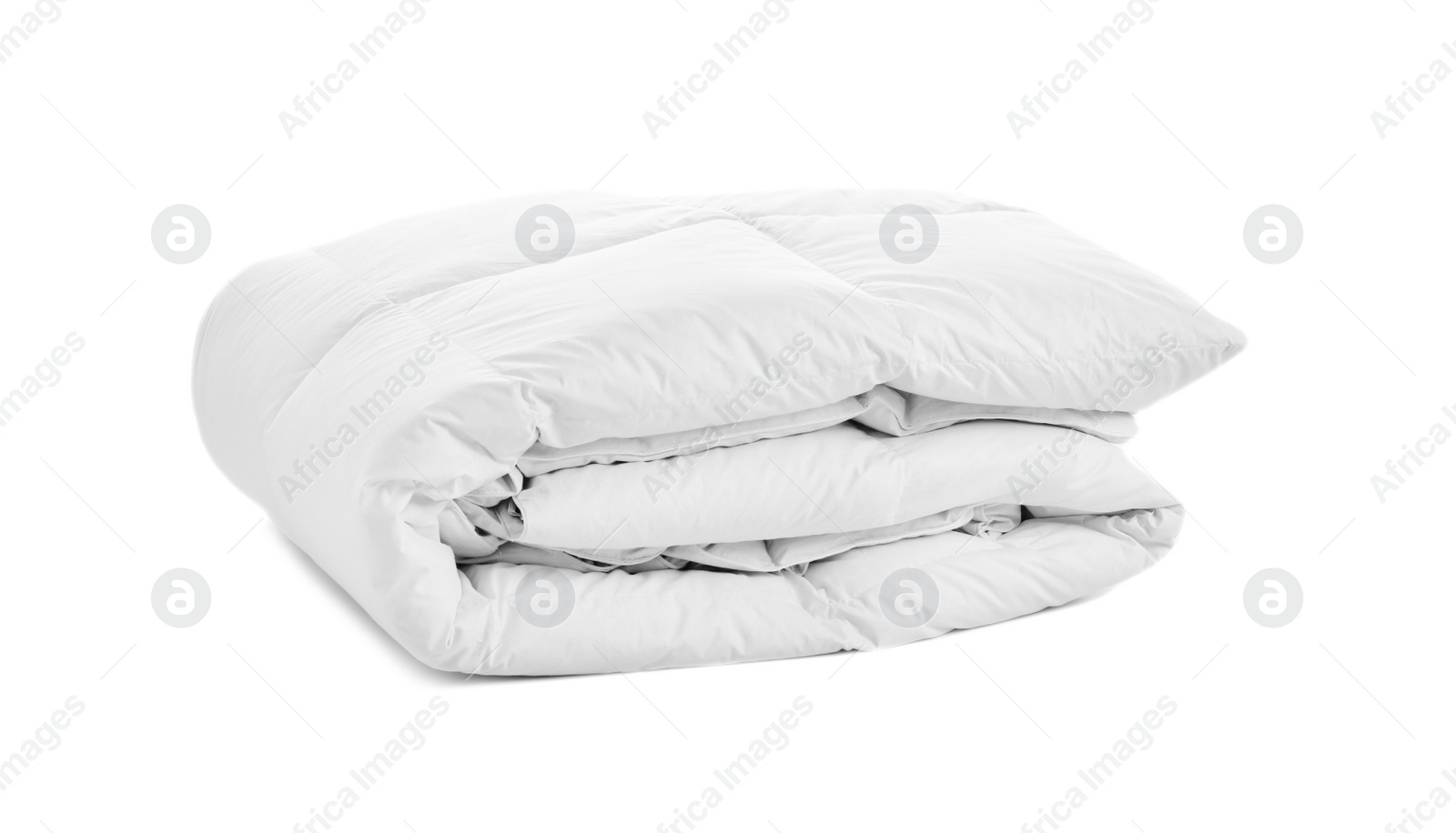 Photo of Folded soft blanket on white background. Textile for bedroom interior