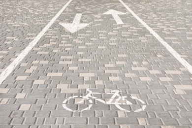 Photo of Bicycle lane with marking on sunny day