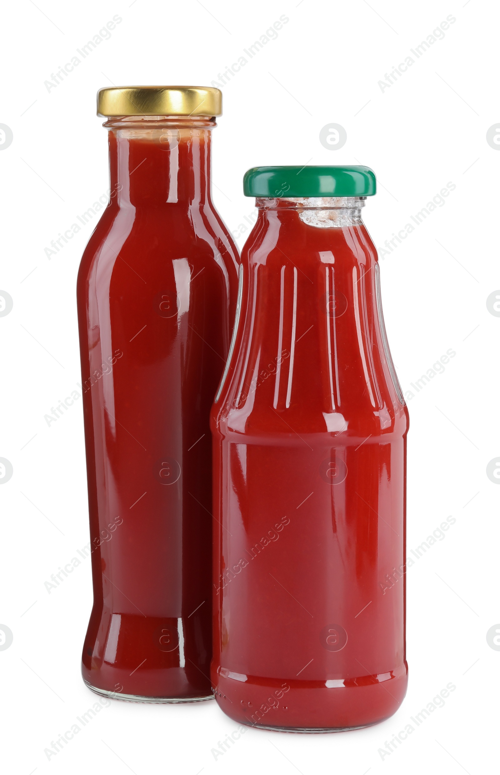 Photo of Different bottles of ketchup on white background