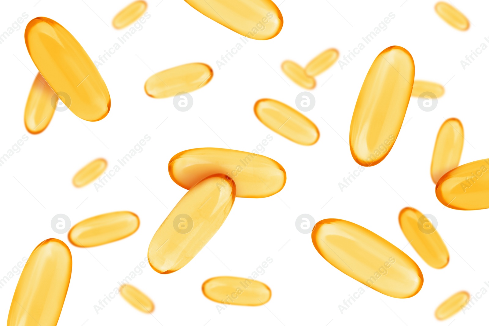 Image of Vitamin. Softgel capsules falling on white background