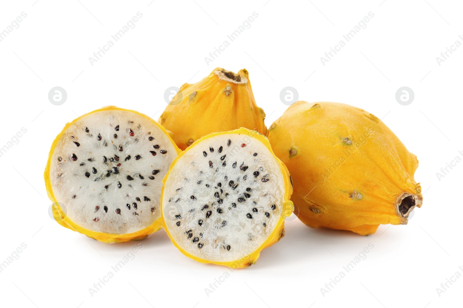 Photo of Delicious cut and whole yellow pitahaya fruits on white background