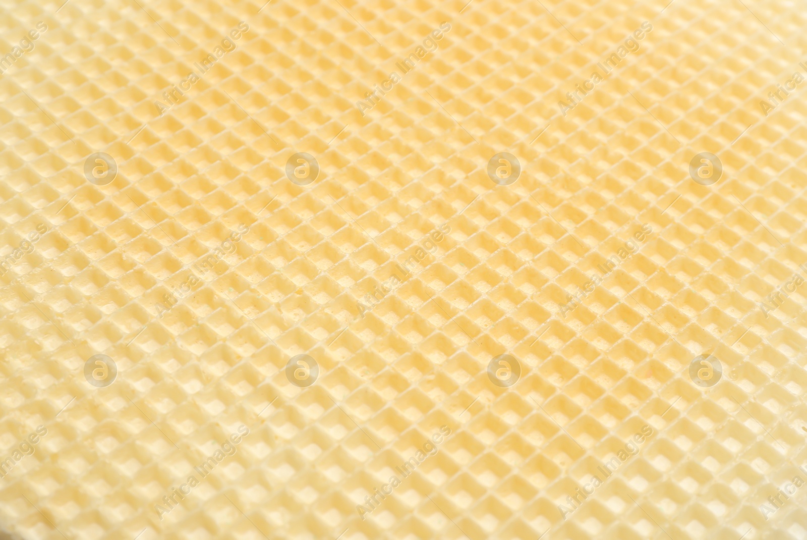 Photo of Tasty wafer as background, closeup. Crispy food