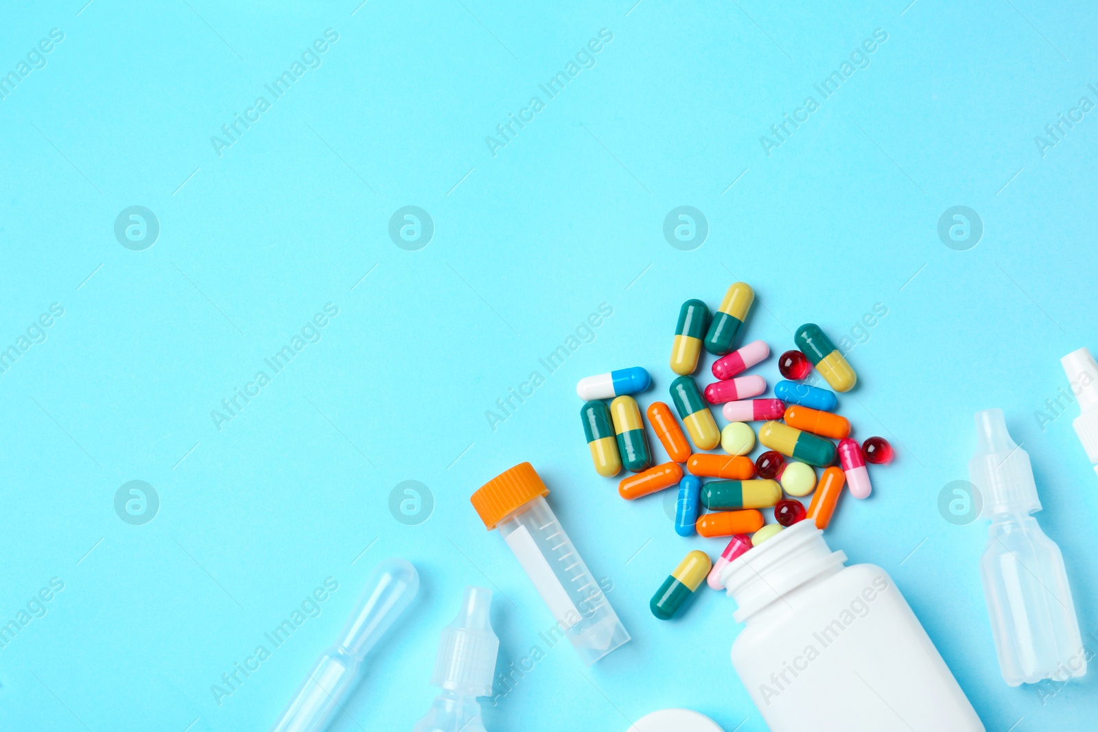 Photo of Flat lay composition with different medical objects and space for text on color background