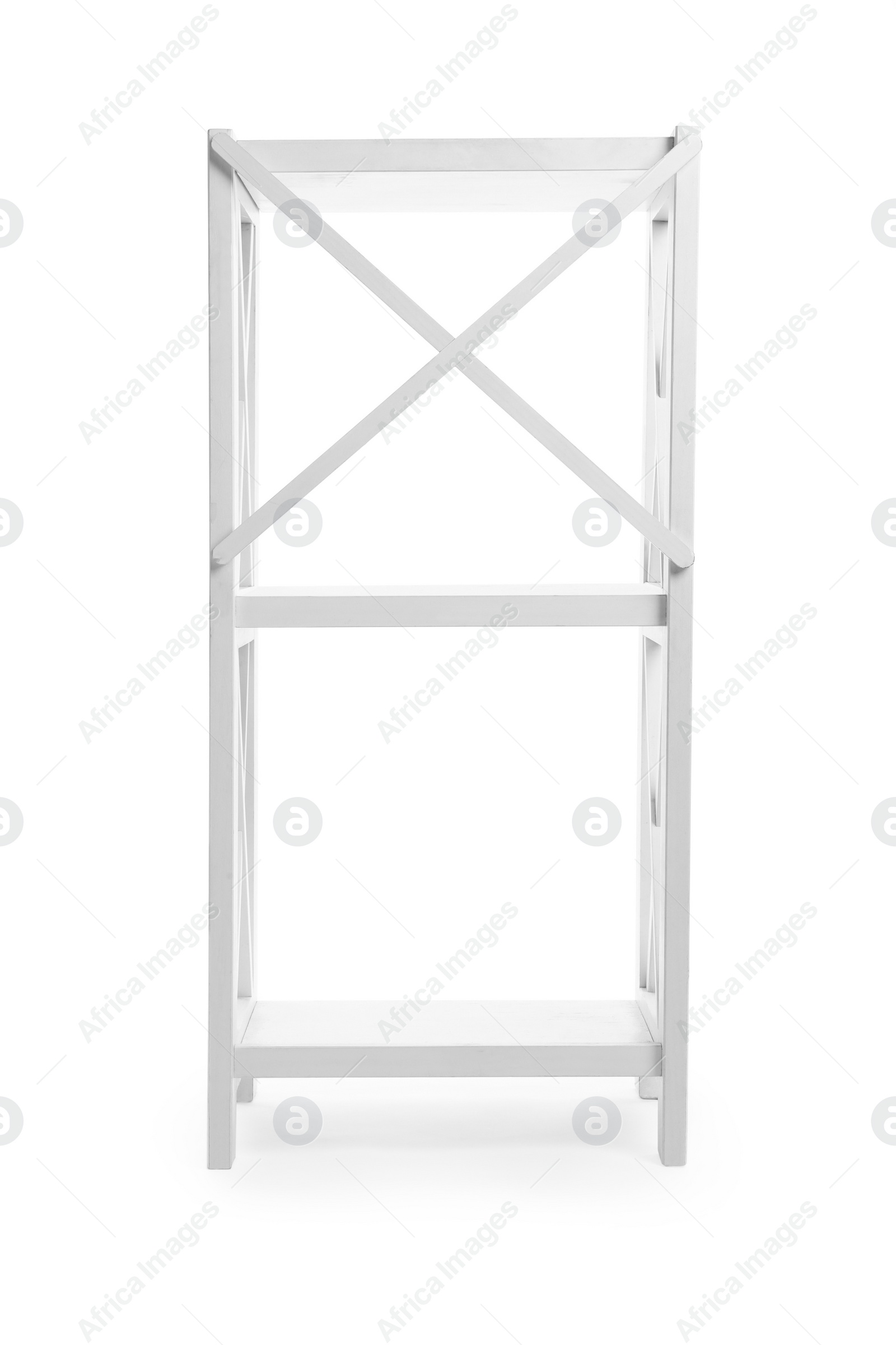 Photo of Empty wooden shelving unit isolated on white