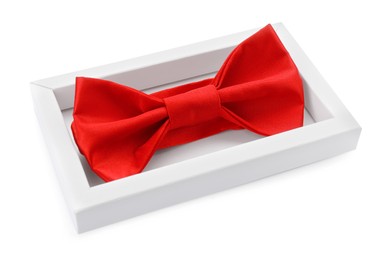 Photo of Stylish red bow tie on white background