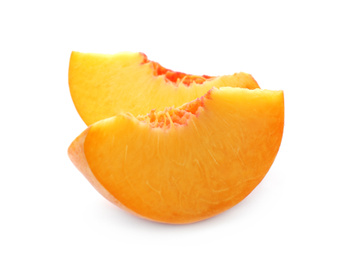 Slices of ripe peach on white background