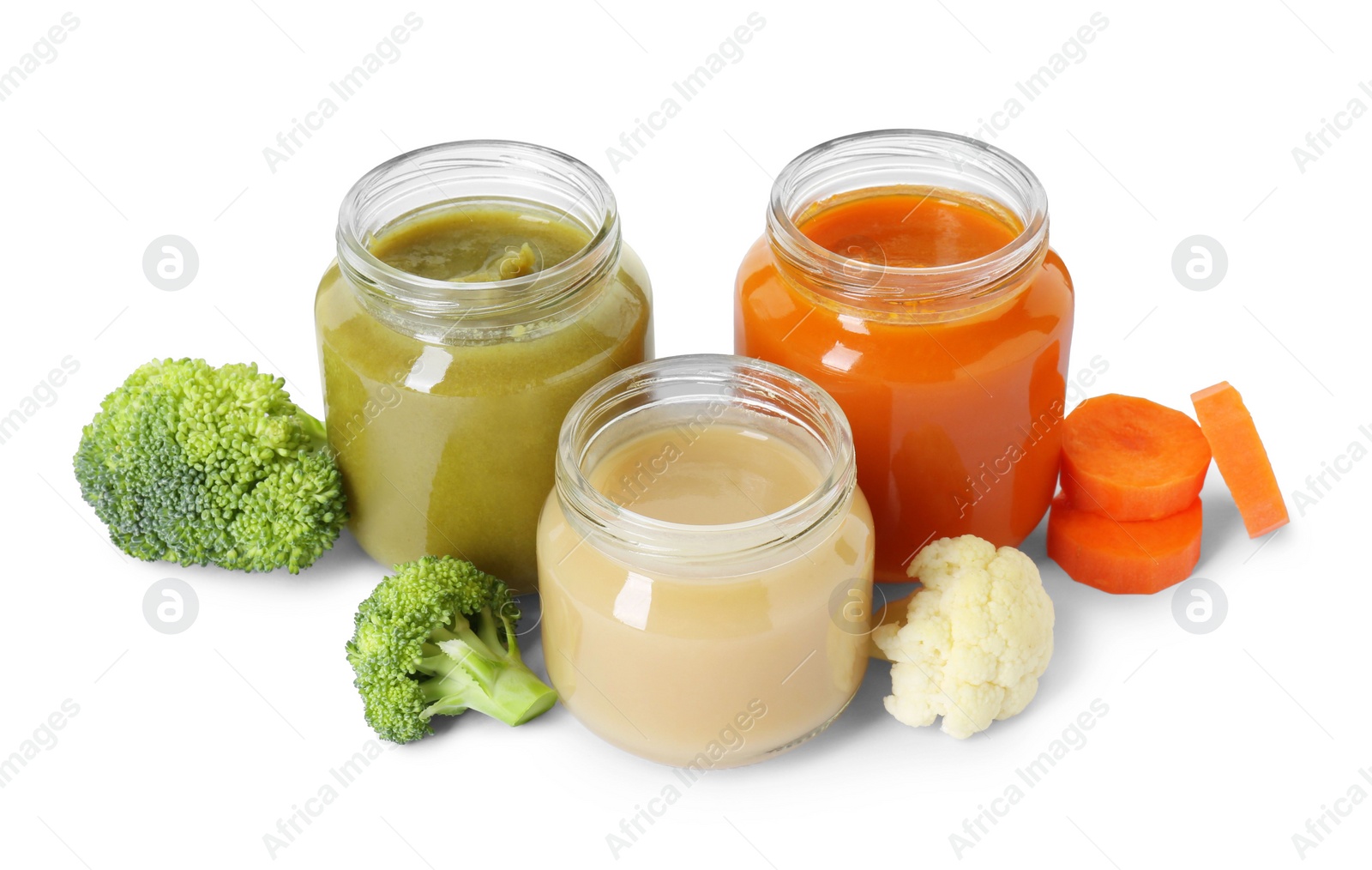 Photo of Jars with healthy baby food, carrot, broccoli and cauliflower isolated on white