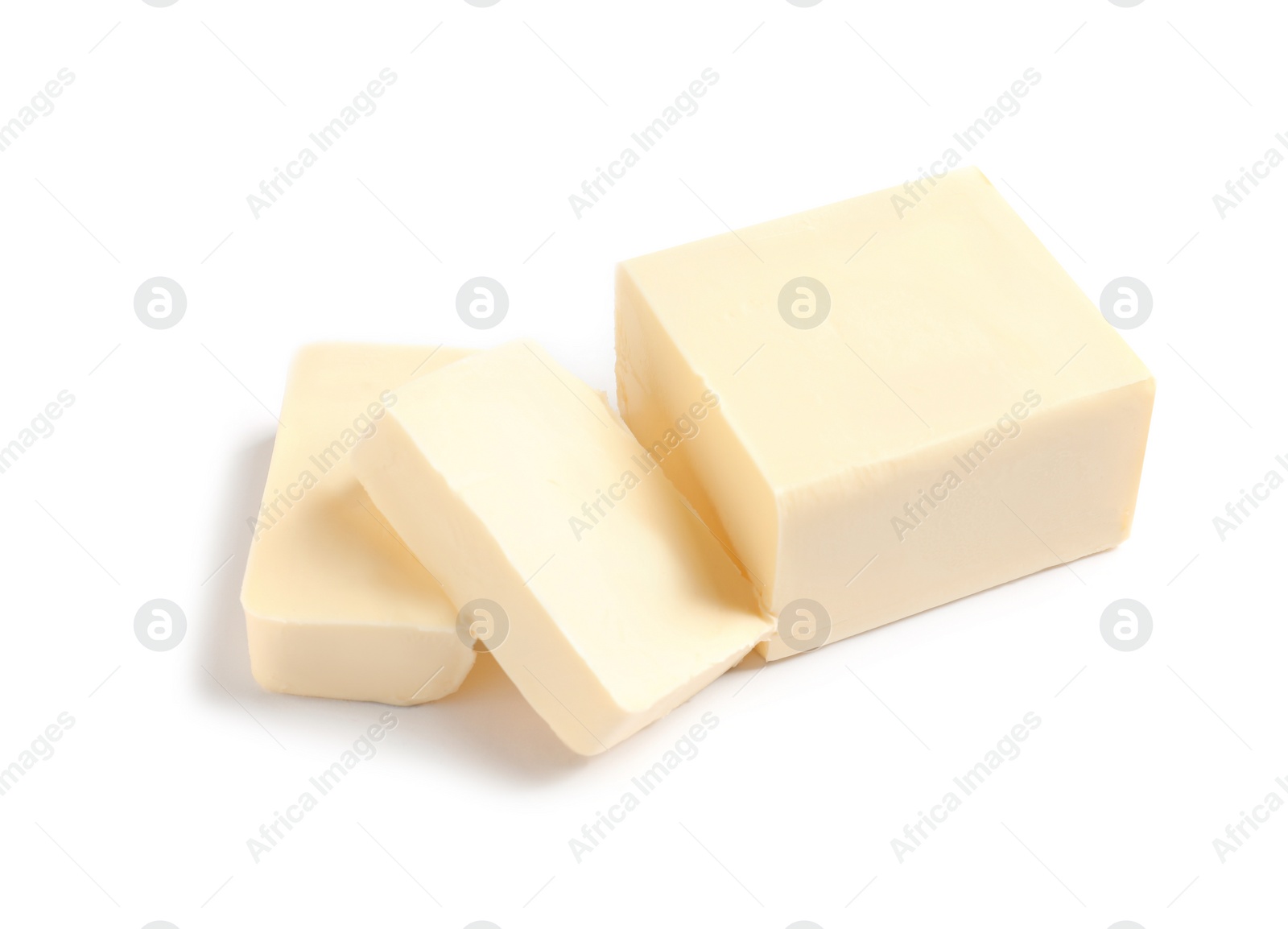 Photo of Cut block of fresh butter on white background