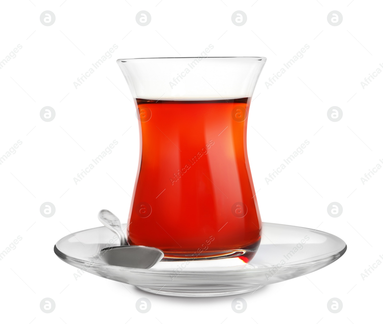 Photo of Glass of traditional Turkish tea with spoon isolated on white