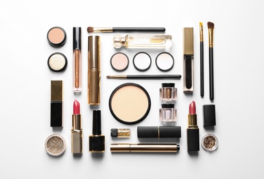 Photo of Set of luxury makeup products on white background, top view