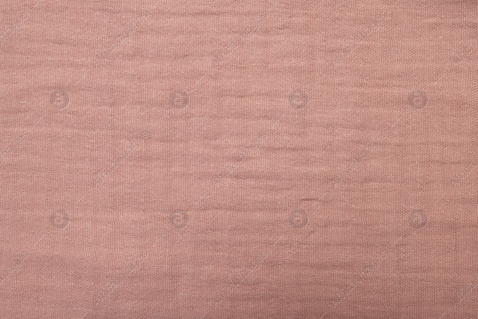 Photo of Texture of soft pastel fabric as background, closeup
