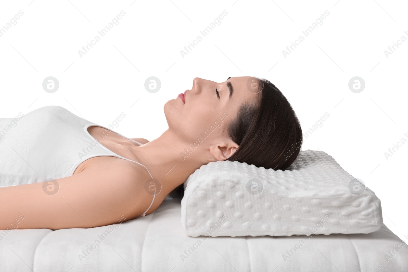 Photo of Woman sleeping on orthopedic pillow against white background