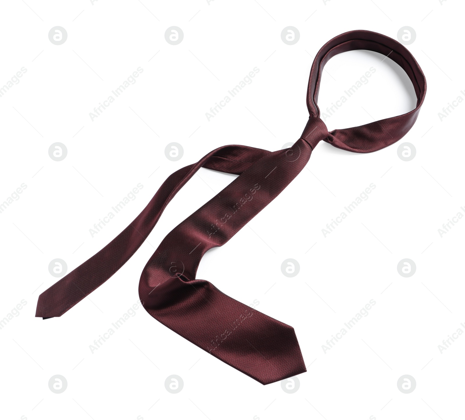 Photo of One brown necktie isolated on white, top view