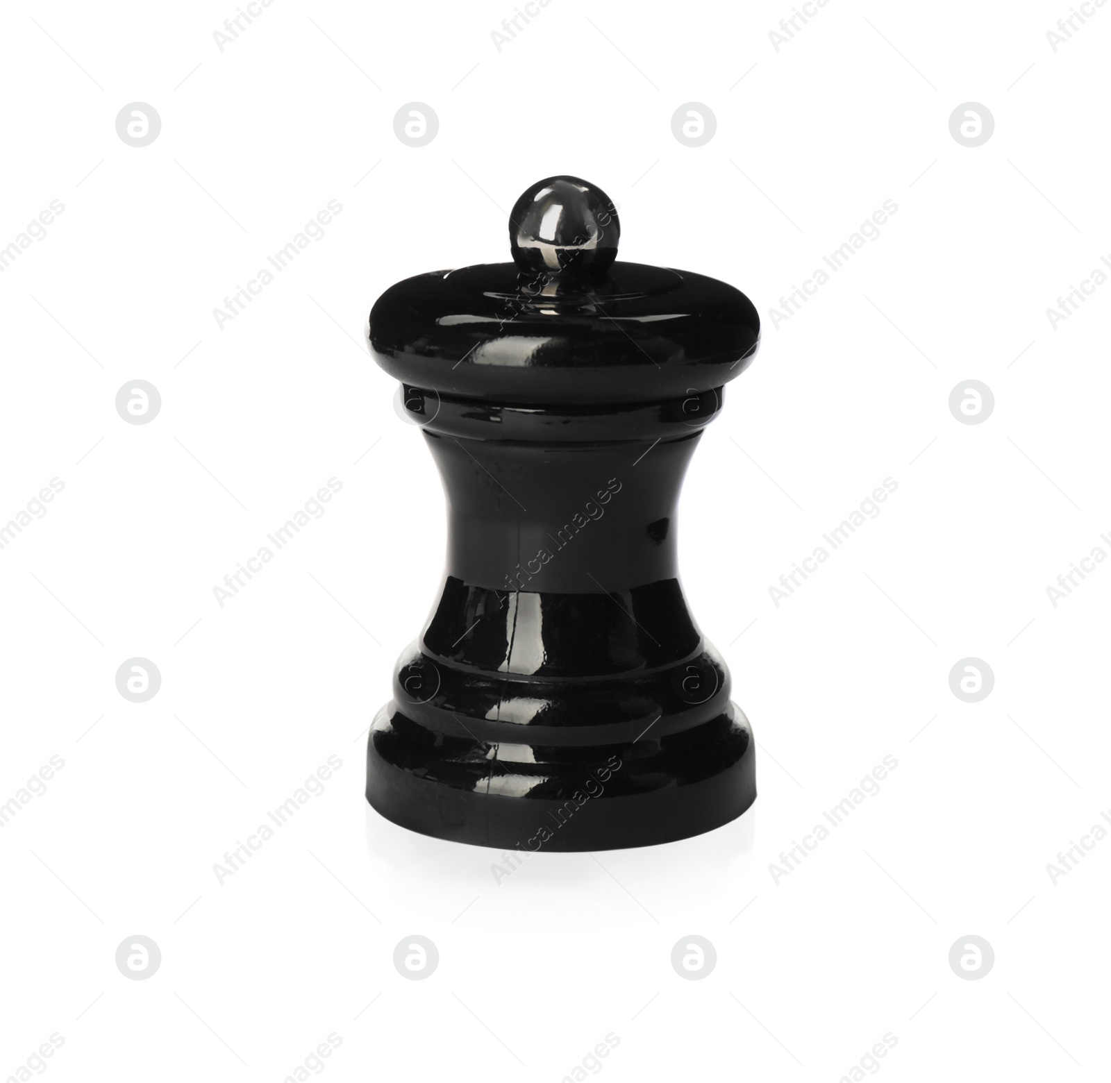 Photo of Black wooden salt or pepper shaker isolated on white. Spice mill