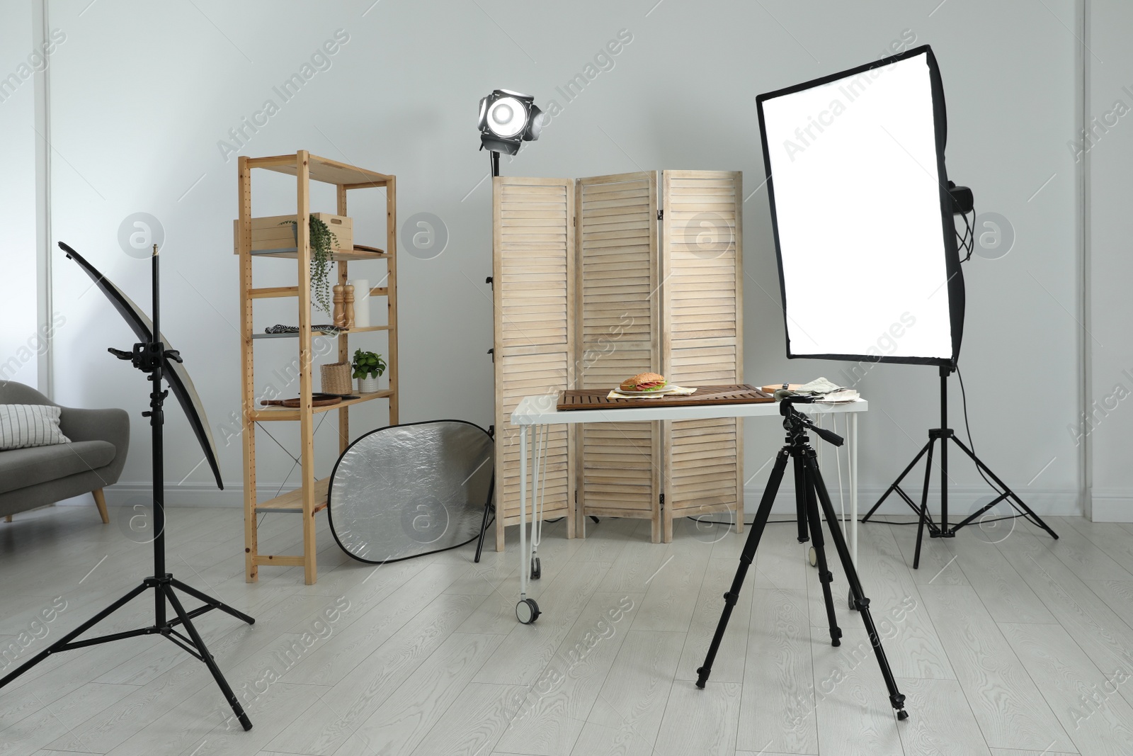 Photo of Tasty sandwich on table in photo studio. Food photography