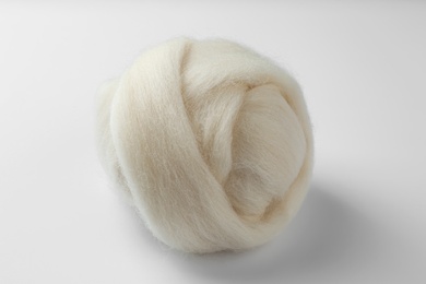 Photo of Ball of combed wool isolated on white