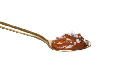 Salted caramel in spoon isolated on white