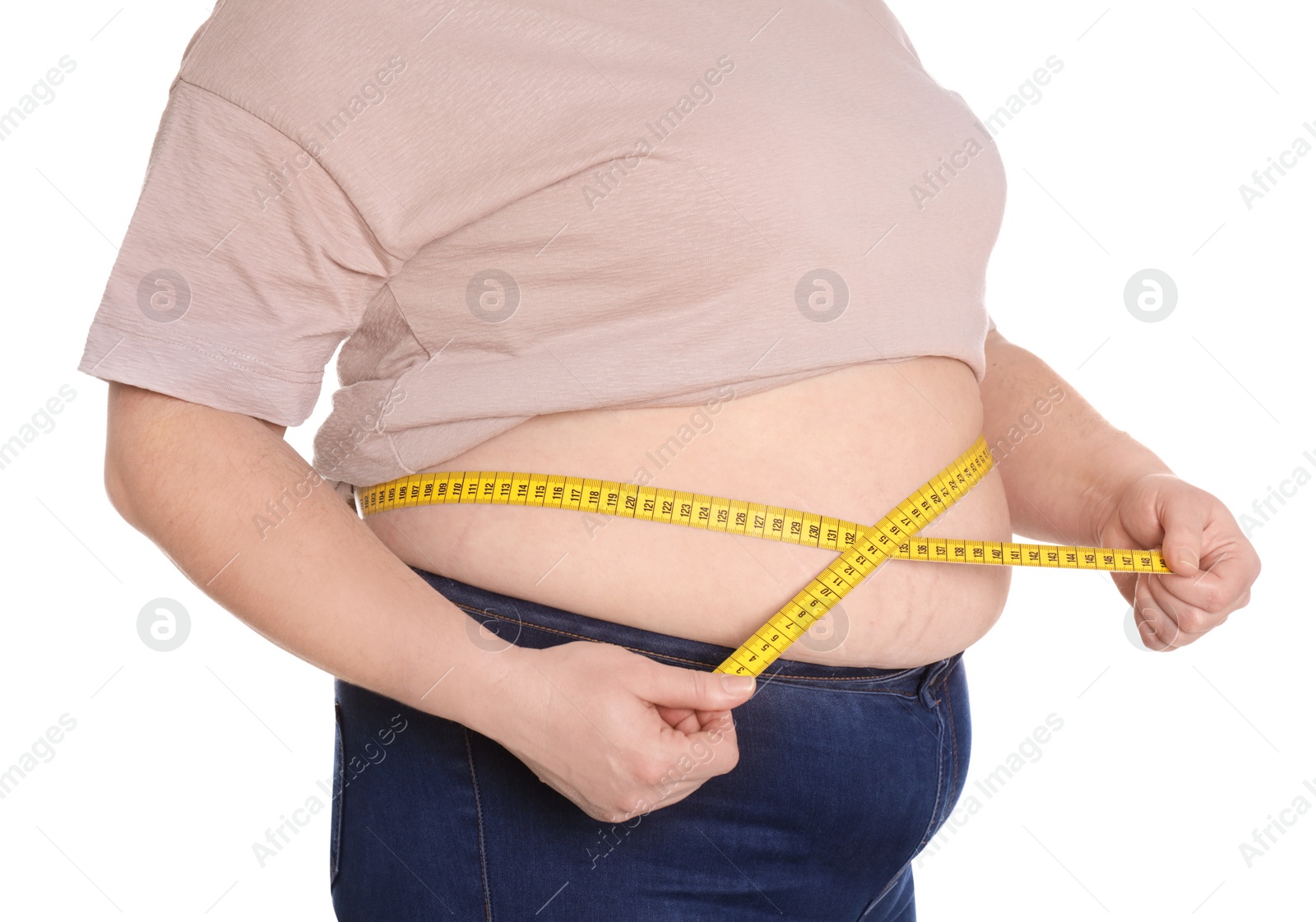 Photo of Overweight woman measuring waist with tape isolated on white, closeup