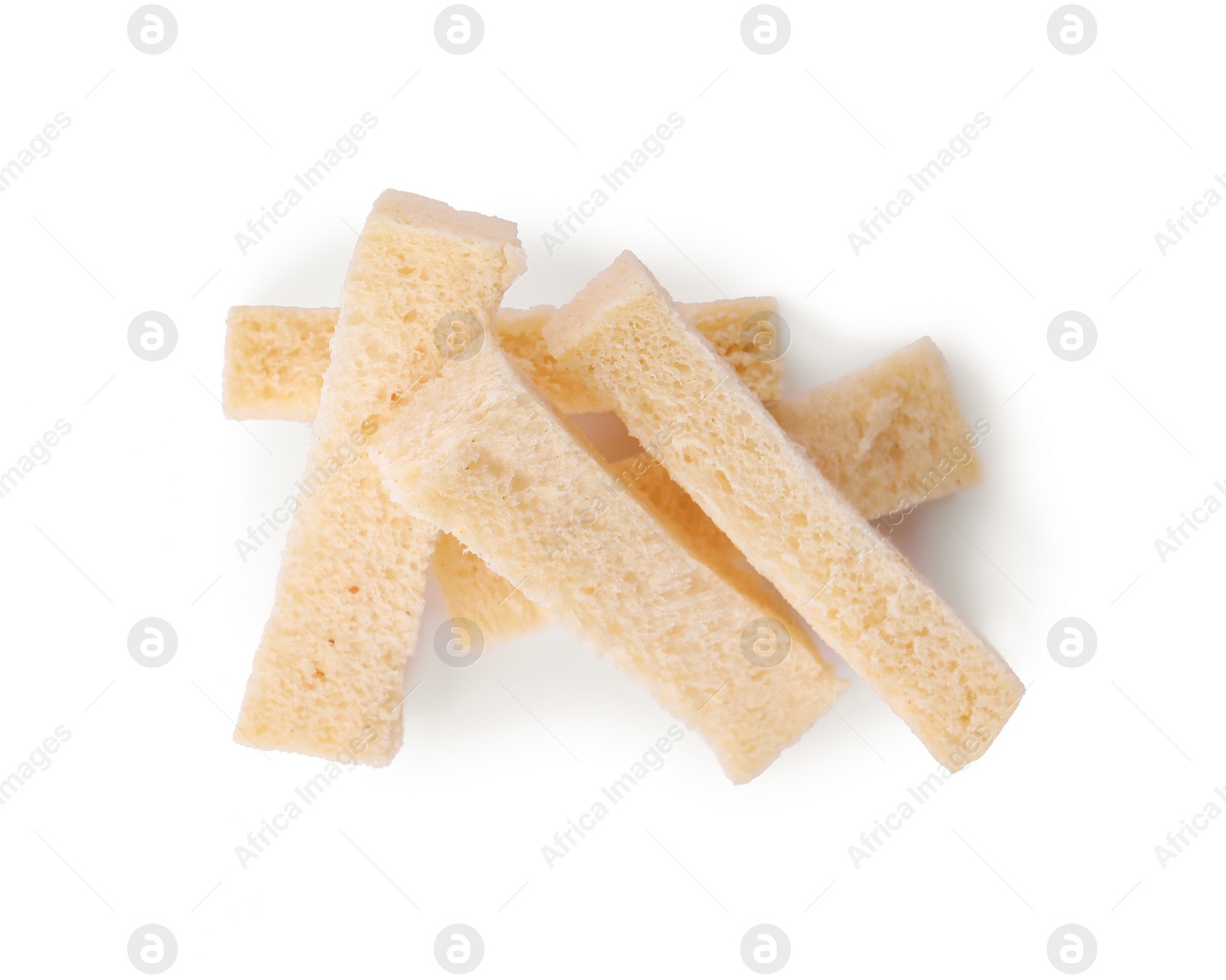 Photo of Crispy rusks on white background, top view