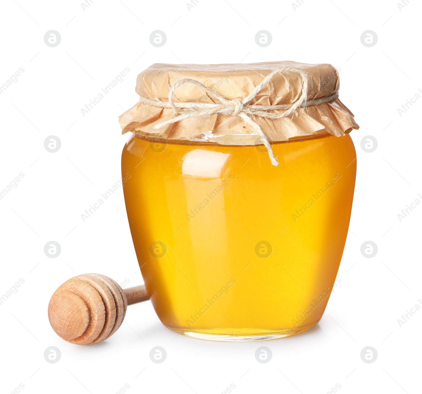 Photo of Tasty honey in glass jar and dipper isolated on white