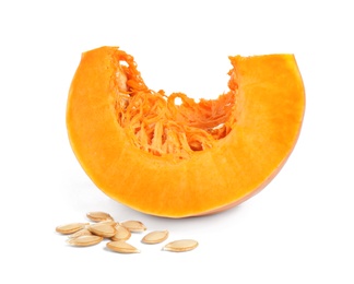 Photo of Piece of ripe orange pumpkin and seeds isolated on white