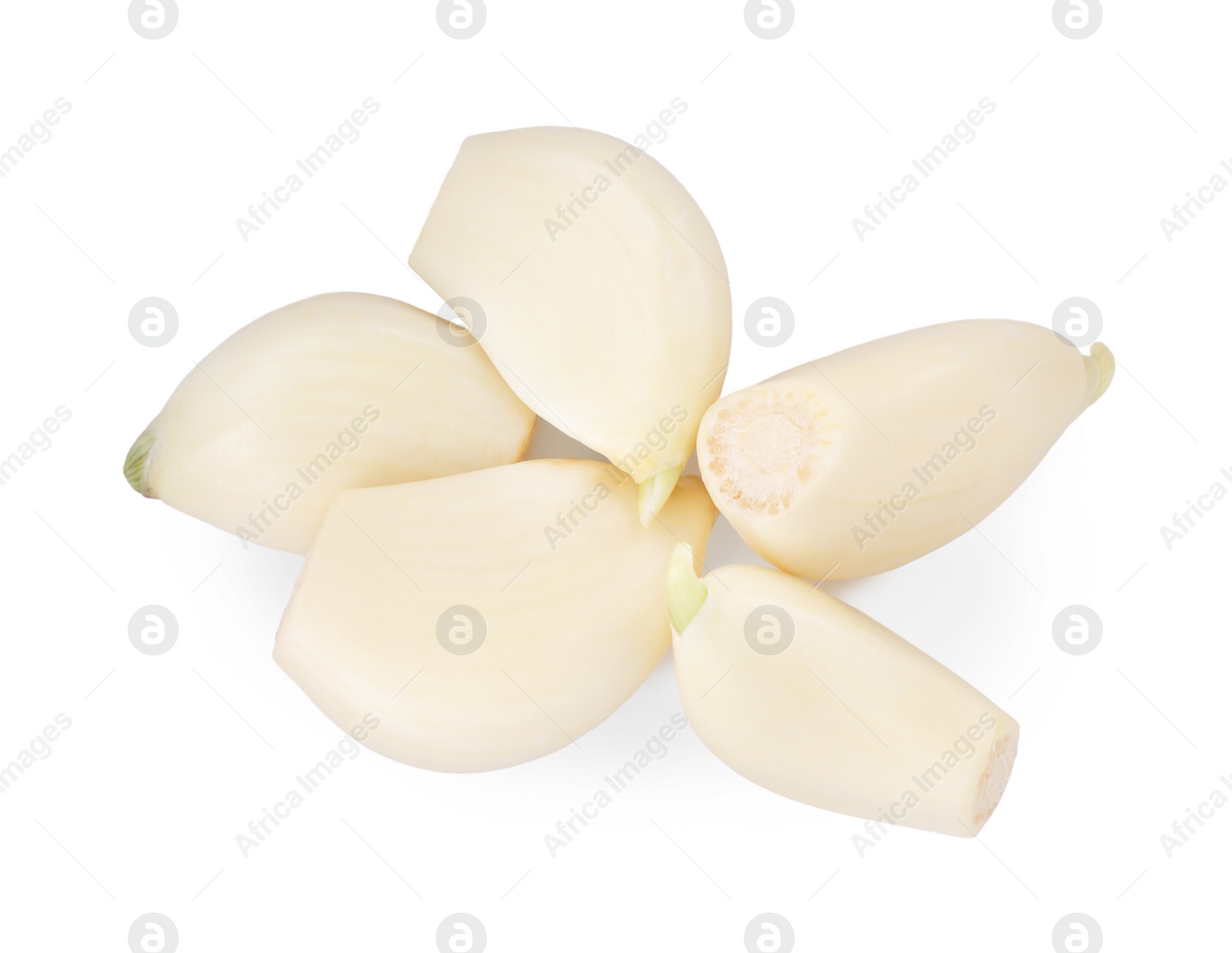 Photo of Peeled cloves of fresh garlic isolated on white, top view