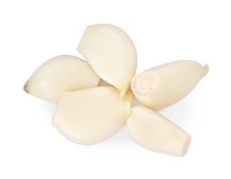 Peeled cloves of fresh garlic isolated on white, top view