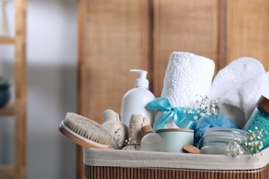 Photo of Spa gift set with different products in bathroom, closeup