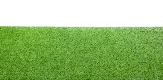 Photo of Green artificial grass surface isolated on white