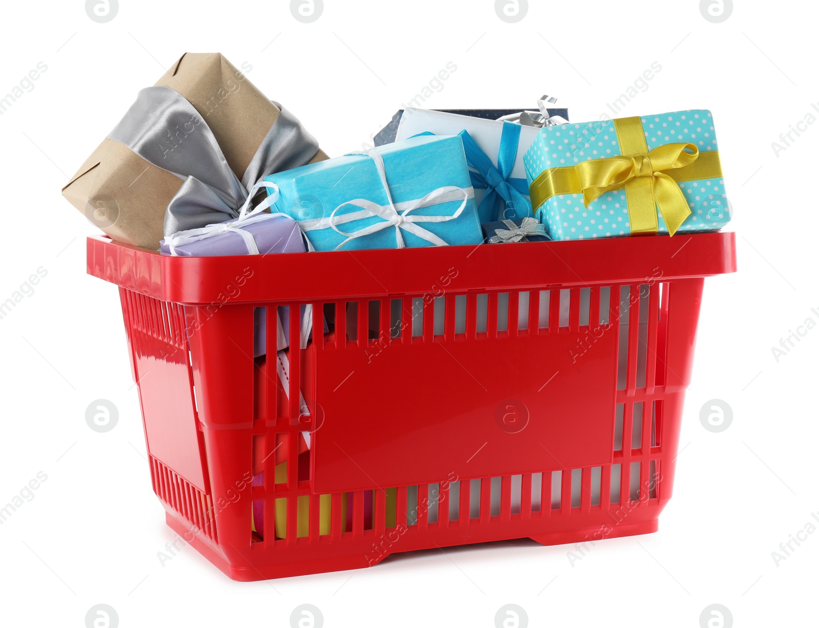 Photo of Red shopping basket with different gifts on white background