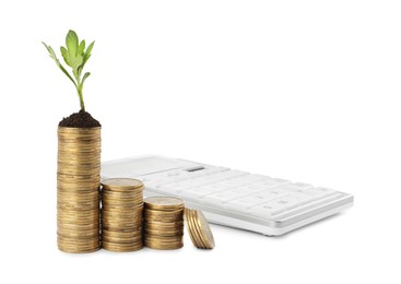 Photo of Stacks of coins with green seedling and calculator isolated on white. Investment concept